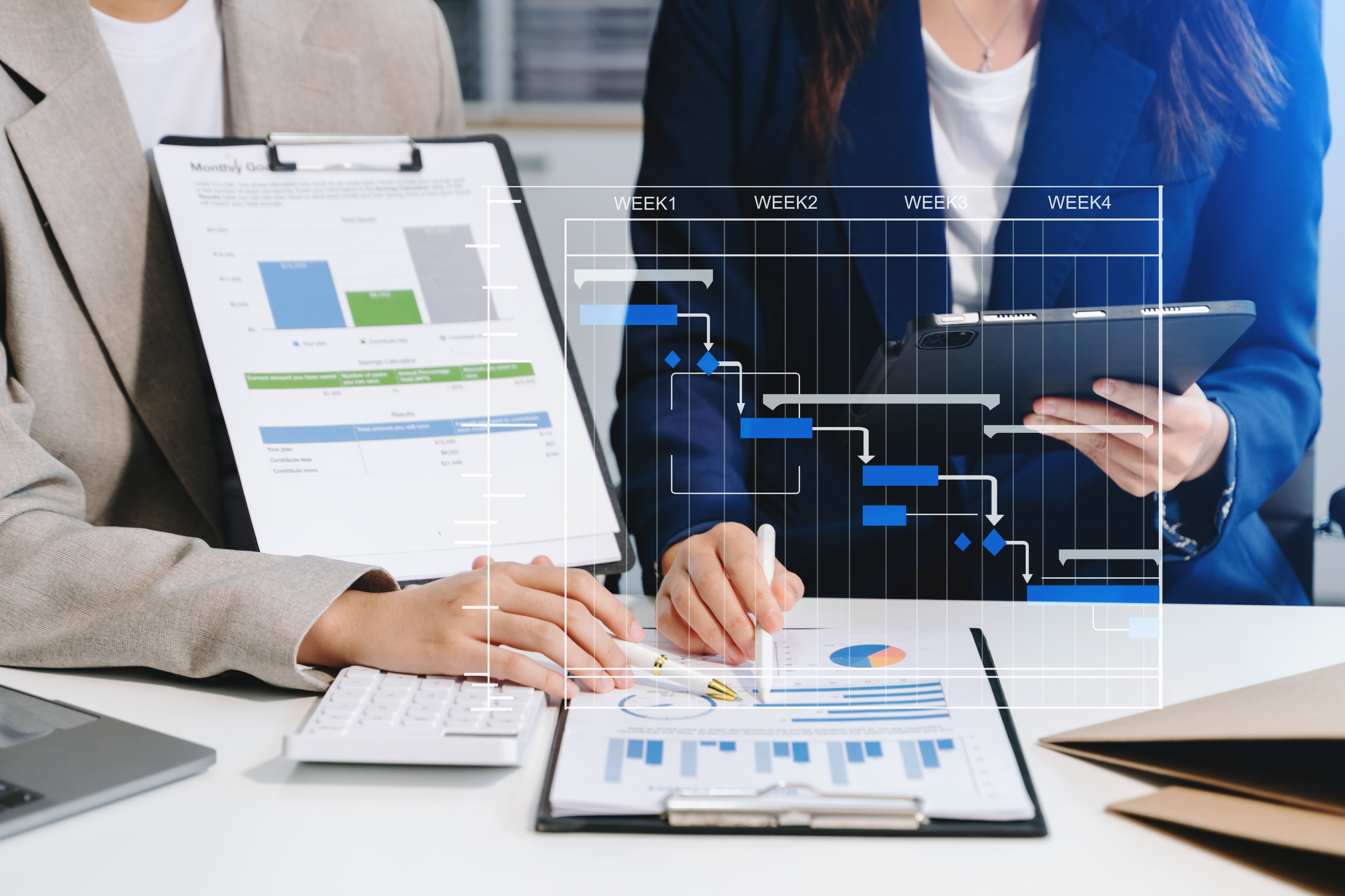 Project manager working and update tasks with milestones progress planning and Gantt chart scheduling diagram.business tram working at office